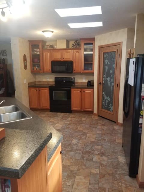 Fully furnished kitchen: coffee maker, toaster, dishes, pots & pans, utensils