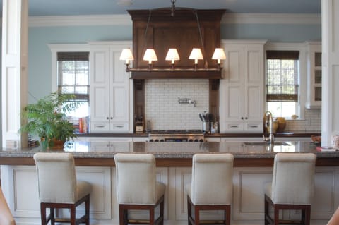 Looking in to the kitchen from the living room, one oven range showing
