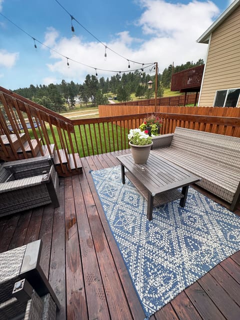 Lower level outdoor lounge space. 