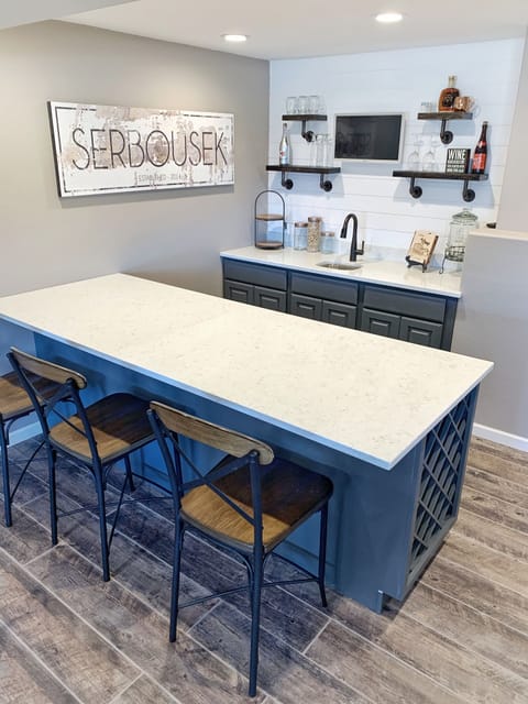 Lower level bar/entertaining space. 