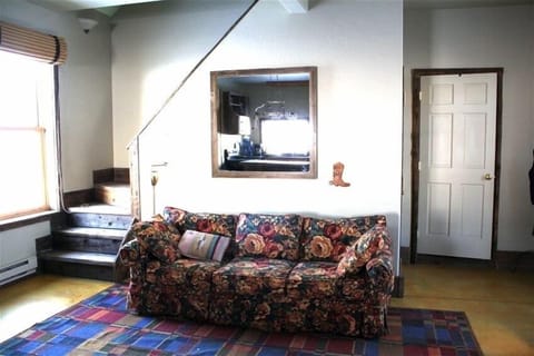 Our downstairs is fun and compact, and light fills the cabin with 7 big windows 