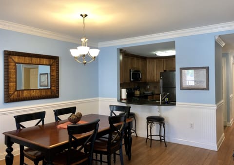 Kitchen opens to living area.
