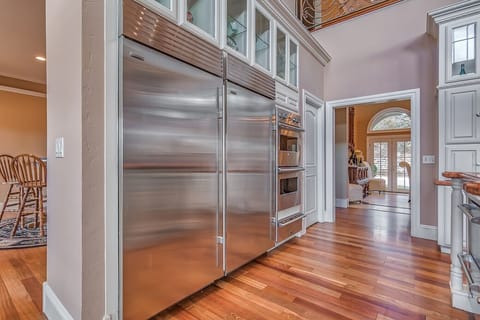 Two commercial Sub-zero size fridges and viking appliances.