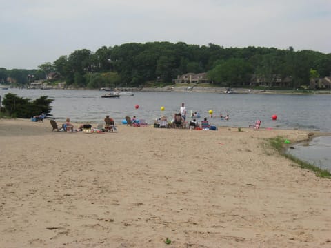 Beach are with the buoys that mark the swimming area--hot day still room for you