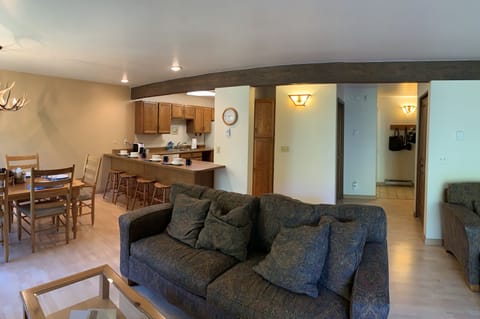 View from living room to powder room and main entry