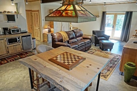 Game or dining table in the lower living room