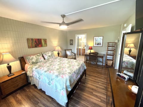 Master Bedroom has Tommy Bahama blanket and pillow covers. 