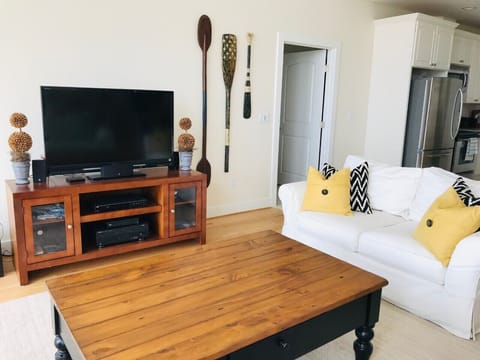 Main floor living room, seats six. AppleTV and variety of DVD movie options.