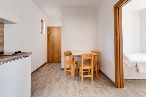 Dining/ kitchen share the same area so you all could enjoy together in the food