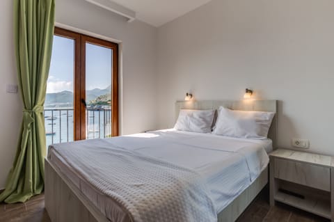 Bright bedroom with king size bed and amazing view