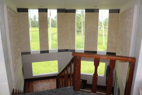 stair case with rice paddies view