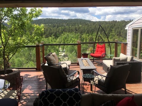 Deck has glass railing for unobstructed view