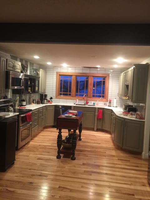 new kitchen updates including enlargement, window, tilework, appliances etc.