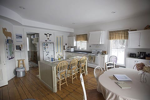 Kitchen looking at coatroom and pantry