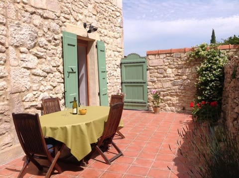 Private sun-bathed terrace accessed from the kitchen & one of the bedrooms.