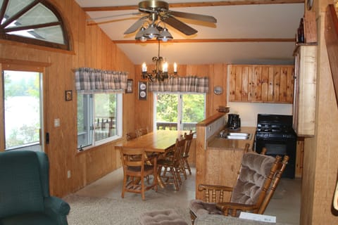 Living room and adjacent kitchen and dining room.