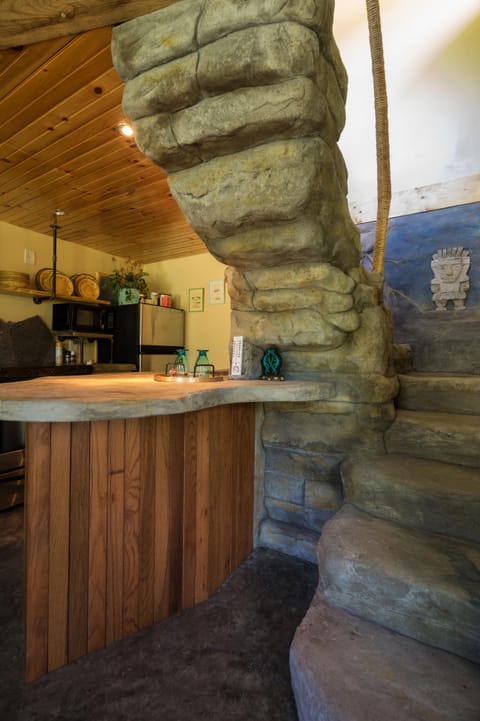 Concrete counter tops and carved stone steps.