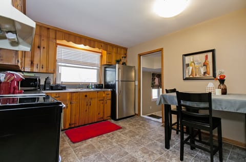 Dine in Kitchen. Stainless Steel appliances.
