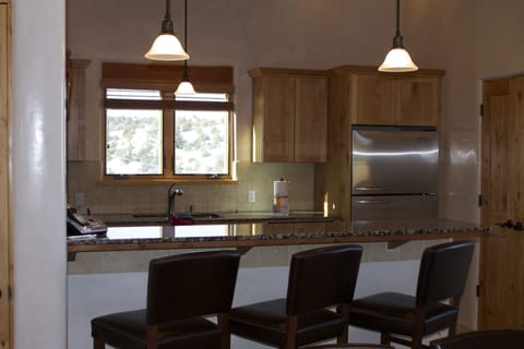 Eat in bar, and countertop. Laptop work area.