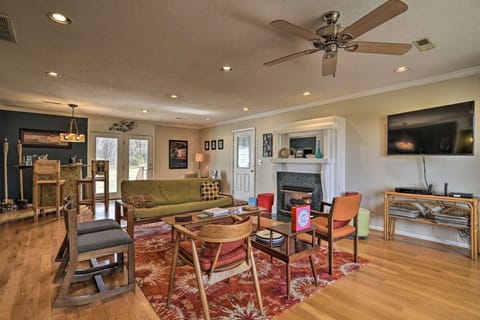 Relax in the huge  living room with authentic mid-century modern furnishings.