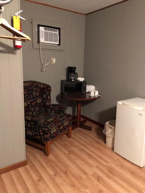 fridge, microwave and coffee pot.