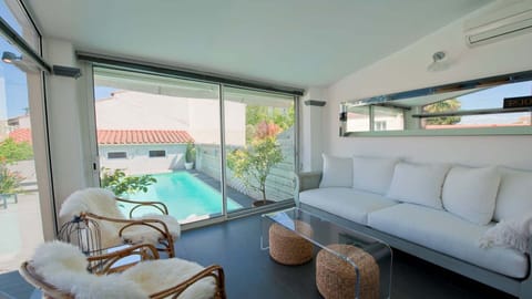 our favorite room in the house, overlooking the pool and garden, what a spot!