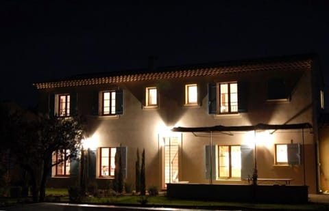 Front view of the house by night
