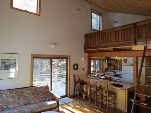 Kitchen, loft, door to deck.