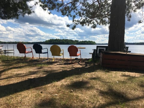 Vintage beach chairs and view of the resort swimming area.