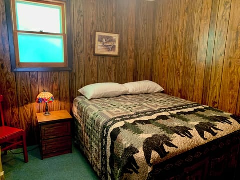 Primary bedroom with a queen bed.