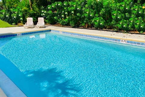 Community amenities: Pool, grill, laundry, outdoor shower, & fenced garden!