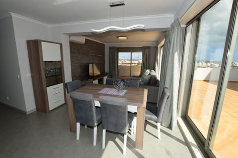 Living Room & Dining Area