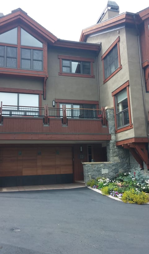 front of unit with garage, ski out back and front (directly across the street).