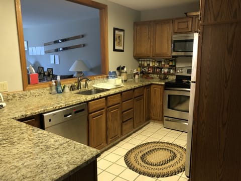 Kitchen is on the main floor it has pans,  dishwasher, silverware, etc.