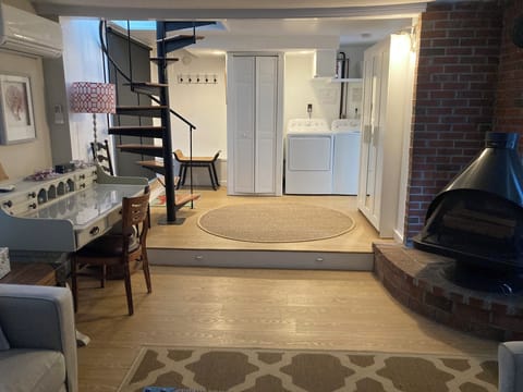 Washer & Dryer, Ample closet space, stairs to upper level and exit door