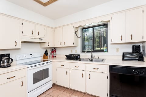 Kitchen includes oven with range, fridge, double sink, dishwasher and more!