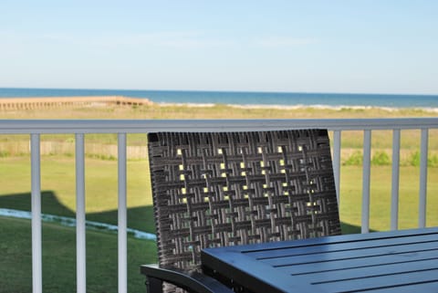 Pull up a chair and relax at Bungalow by the Sea.