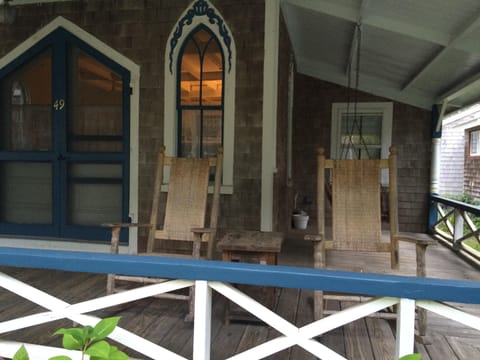 Front porch with wicker rockers.  Great for a morning coffee or evening drink.
