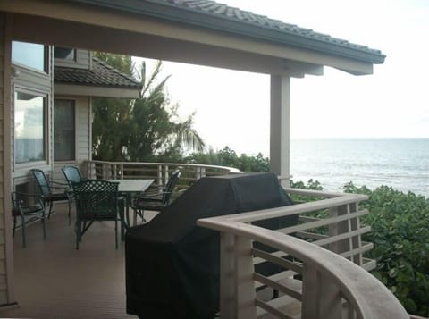 Oceanfront lanai dining with propane grill