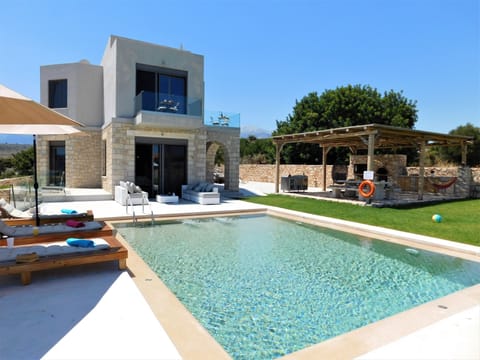 Boutique House, pool and barbeque/dining terrace. 