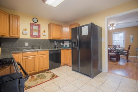 Side by side refrigerator large enough for a full vacation stay.