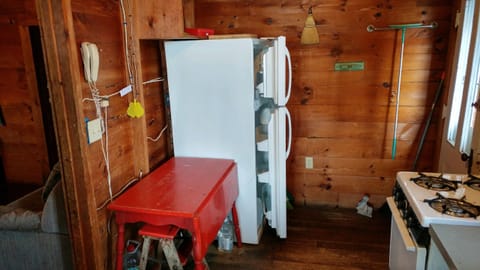 looking west in kitchen, entrance door on rt, living rm on lft