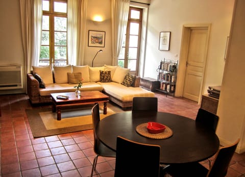 Living room - open plan, doors and windows onto private garden