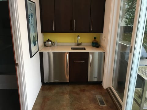 Wet bar area near pool entrance