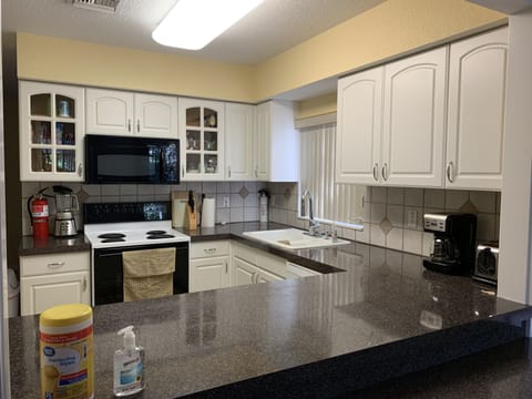 Kitchen ready for your stay with all items to welcome your relaxing stay