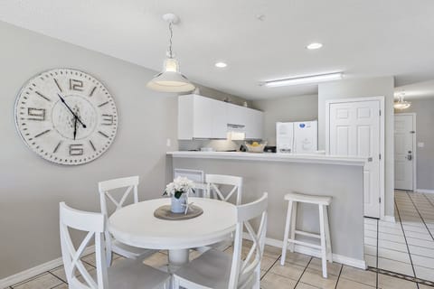 Dining Table Seats Four, plus Additional Counter Seating.'