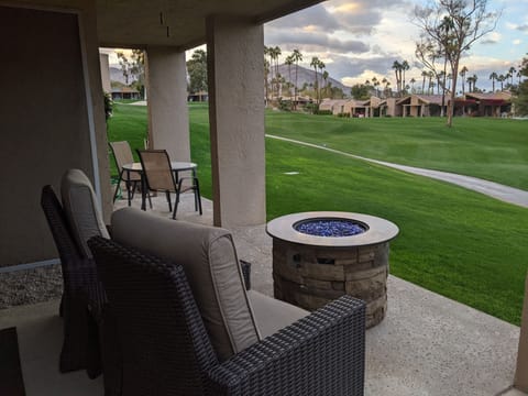 Pair of recliners and a fire pit to enjoy the outside space.
