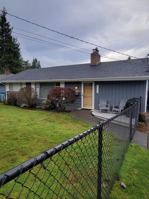 Fully fenced front yard for pets and kids.