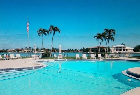 Coquina Club pool with clubroom, shop, fishing, boating, showers and sauna.