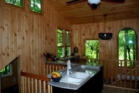 Eco Cabin Kitchen, Hobbit Room opening on bottom left of photo